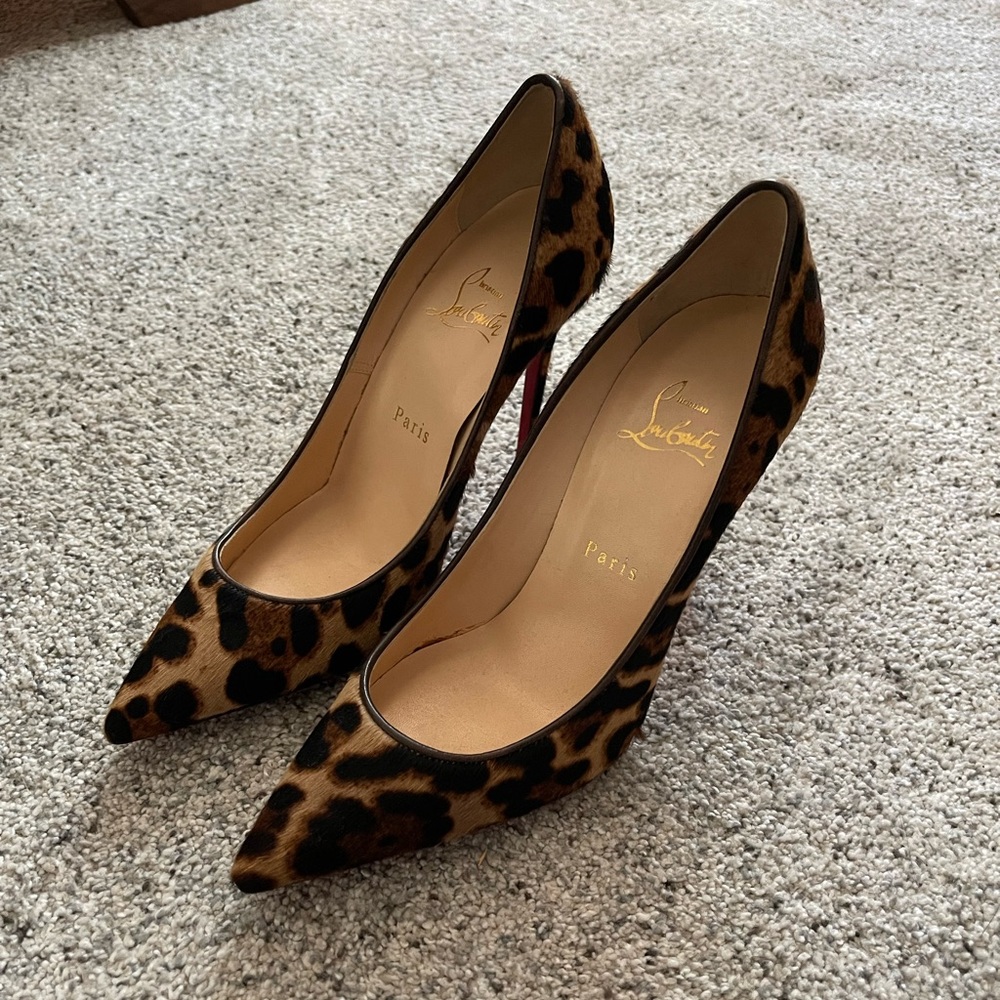 Sold Christian Louboutin pony hair leopard pumps